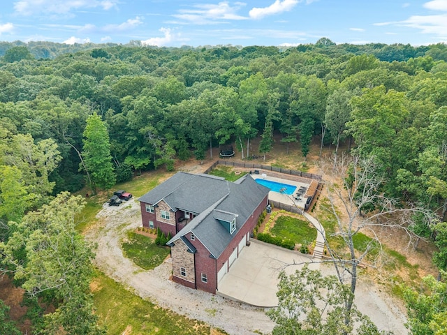 121 Regency Ln, Dickson, TN 37055 - aerial view of property and surrounding area with a pool area and a heavily wooded area
