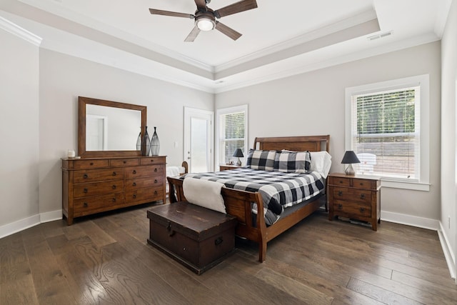 121 Regency Ln, Dickson, TN 37055 - bedroom with ornamental molding, multiple windows, a raised ceiling, and dark wood-type flooring