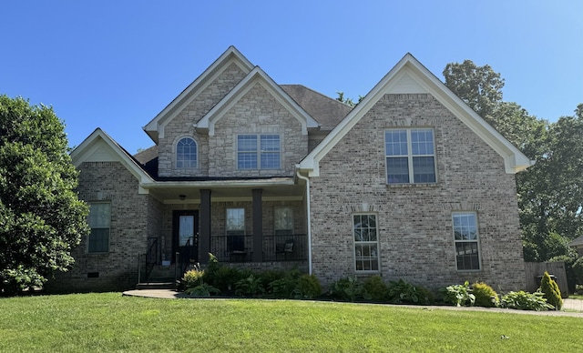 3692 Prestwicke Pl, Adams, TN 37010 - craftsman house with a front lawn, a porch, and brick siding