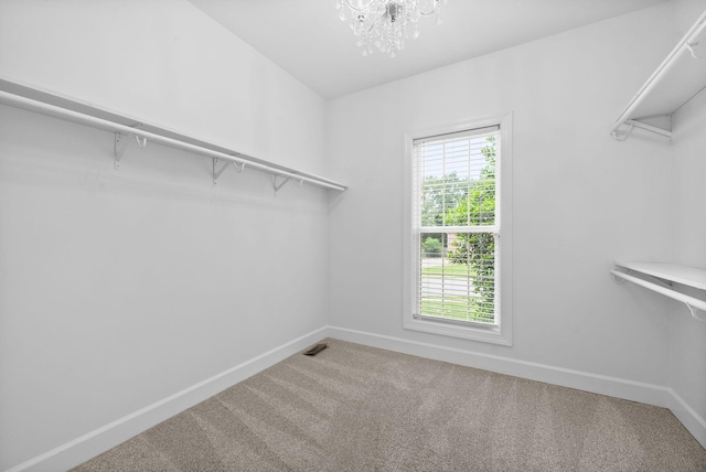 3692 Prestwicke Pl, Adams, TN 37010 - spacious closet featuring carpet flooring and a chandelier