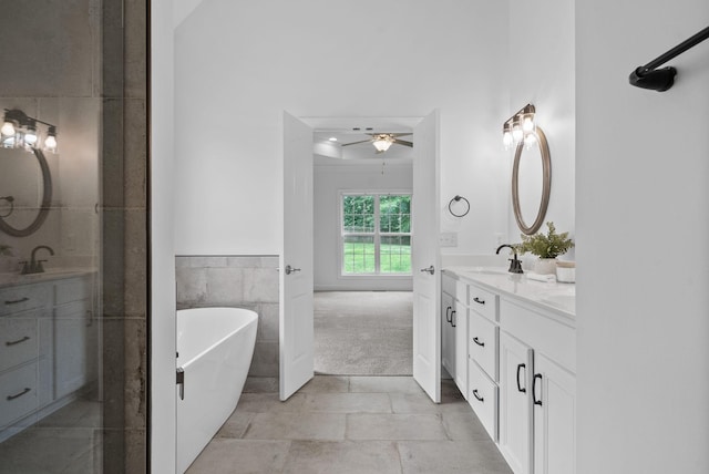 3692 Prestwicke Pl, Adams, TN 37010 - full bath featuring double vanity, ceiling fan, and a freestanding tub
