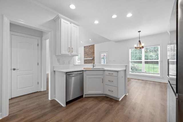 3692 Prestwicke Pl, Adams, TN 37010 - kitchen featuring stainless steel dishwasher, a peninsula, dark wood-style flooring, white cabinetry, and light countertops