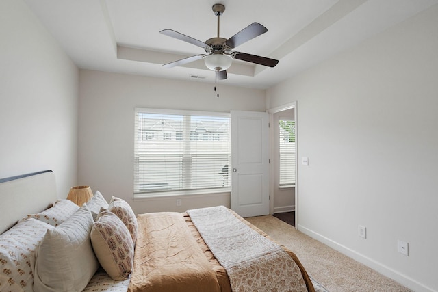 1710 Lone Jack Ln, Murfreesboro, TN 37129 - bedroom with baseboards, light colored carpet, a tray ceiling, and ceiling fan