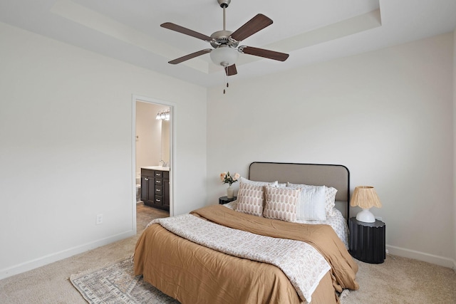 1710 Lone Jack Ln, Murfreesboro, TN 37129 - carpeted bedroom with baseboards, ensuite bathroom, a raised ceiling, and a ceiling fan
