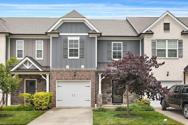 1710 Lone Jack Ln, Murfreesboro, TN 37129 - view of property with board and batten siding, roof with shingles, driveway, and an attached garage