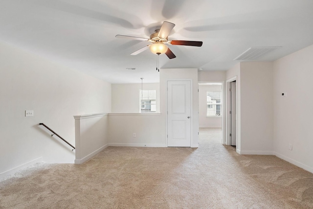 1710 Lone Jack Ln, Murfreesboro, TN 37129 - empty room with light carpet, a ceiling fan, and baseboards