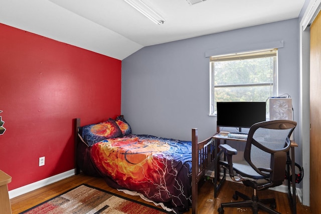 51 N Case Ave, Trenton, GA 30752 - bedroom with wood finished floors, lofted ceiling, baseboards, and an office area