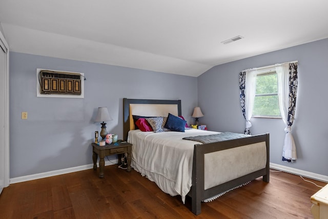 51 N Case Ave, Trenton, GA 30752 - bedroom with wood finished floors, an AC wall unit, baseboards, and lofted ceiling