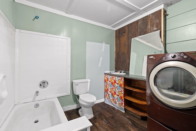 51 N Case Ave, Trenton, GA 30752 - bathroom featuring washer / clothes dryer, wood finished floors, toilet, and tub / shower combination