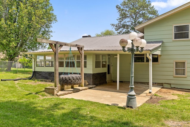 51 N Case Ave, Trenton, GA 30752 - rear view of property featuring metal roof and a patio area