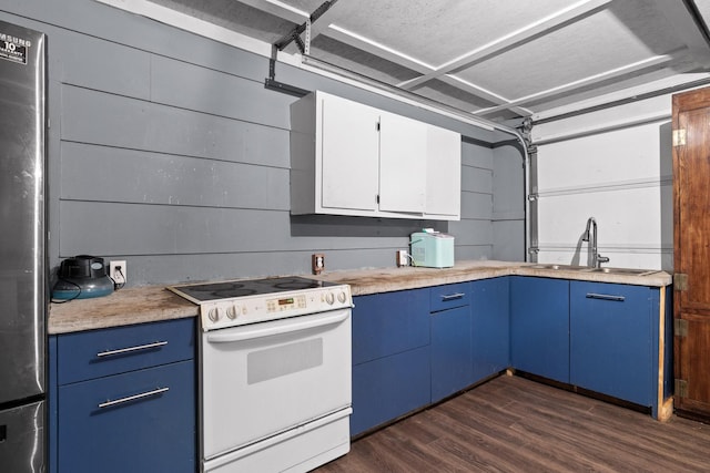 51 N Case Ave, Trenton, GA 30752 - kitchen featuring white electric range, blue cabinetry, a sink, dark wood-style floors, and white cabinetry