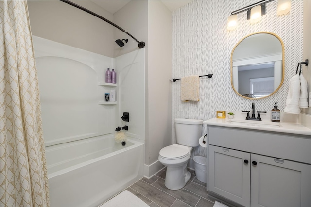 140 Barlow Dr, Franklin, TN 37064 - bathroom with shower / tub combo with curtain, vanity, toilet, wallpapered walls, and baseboards