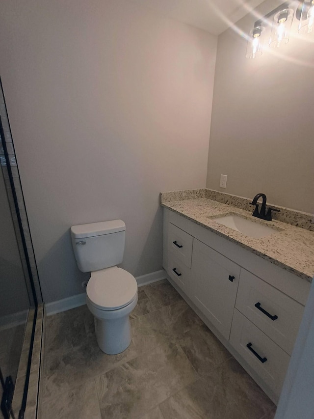 657 Chaffin Rd, Lafayette, TN 37083 - bathroom featuring vanity, toilet, baseboards, and a shower