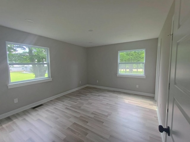 657 Chaffin Rd, Lafayette, TN 37083 - unfurnished room with light wood-style floors and baseboards