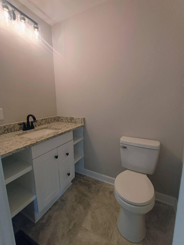 657 Chaffin Rd, Lafayette, TN 37083 - half bathroom with toilet, vanity, and baseboards