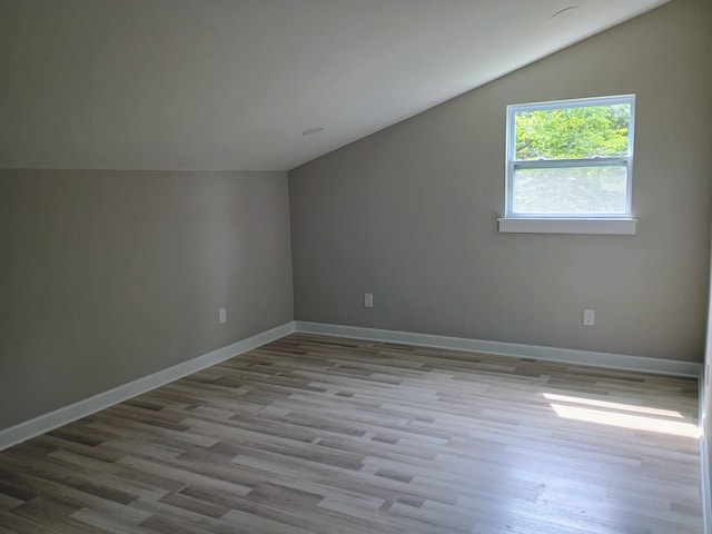 657 Chaffin Rd, Lafayette, TN 37083 - additional living space featuring vaulted ceiling, wood finished floors, and baseboards