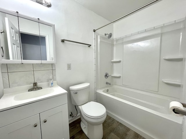 1804 Mchenry Dr, Hopkinsville, KY 42240 - bathroom with tasteful backsplash, bathing tub / shower combination, vanity, toilet, and wood finished floors
