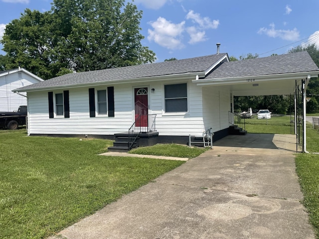 1804 Mchenry Dr, Hopkinsville, KY 42240 - view of front facade with driveway, a front yard, a shingled roof, and an attached carport