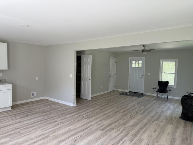 711 Gwen St, Paris, TN 38242 - living room featuring light wood finished floors and ceiling fan