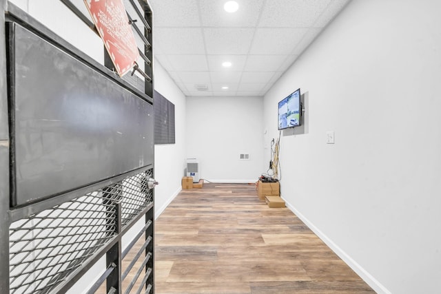4510 Akin Rd, Cunningham, TN 37052 - hallway with recessed lighting, light wood-type flooring, and a paneled ceiling