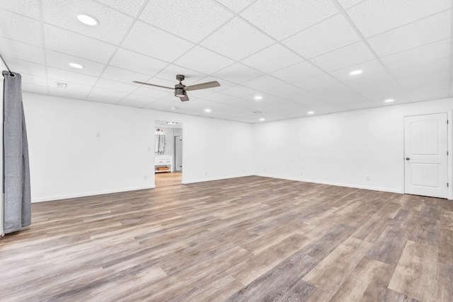 4510 Akin Rd, Cunningham, TN 37052 - unfurnished living room featuring a paneled ceiling, ceiling fan, wood finished floors, and recessed lighting
