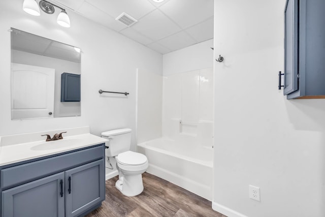 4510 Akin Rd, Cunningham, TN 37052 - full bath featuring vanity, a paneled ceiling, wood finished floors, and bathing tub / shower combination