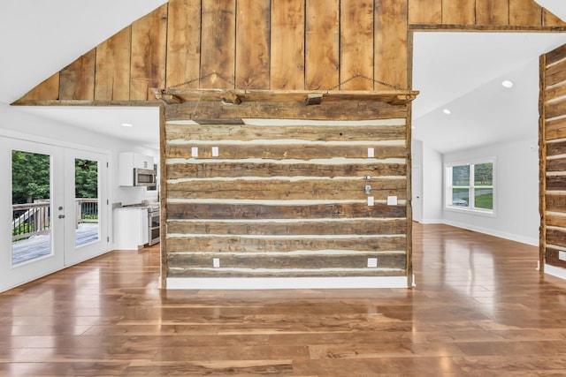 4510 Akin Rd, Cunningham, TN 37052 - staircase with wood finished floors, wooden walls, french doors, high vaulted ceiling, and recessed lighting