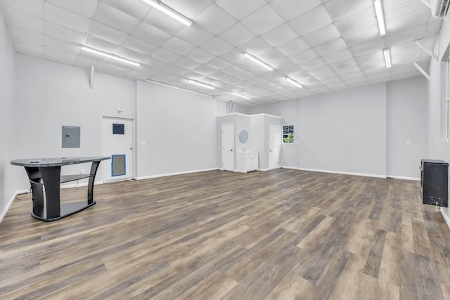 4510 Akin Rd, Cunningham, TN 37052 - miscellaneous room with wood finished floors, electric panel, and a drop ceiling
