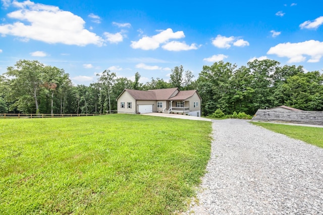 4510 Akin Rd, Cunningham, TN 37052 - ranch-style house with gravel driveway and a garage