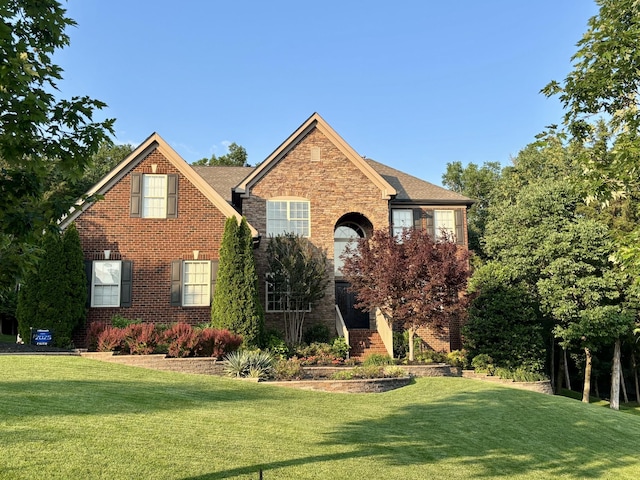 2064 Catalina Way, Nolensville, TN 37135 - traditional home with a front lawn and brick siding