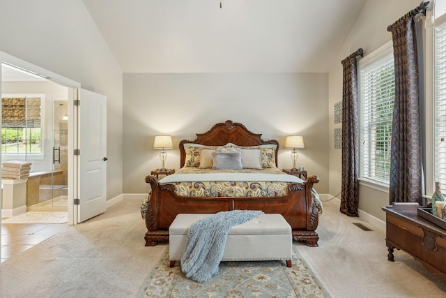 2064 Catalina Way, Nolensville, TN 37135 - carpeted bedroom featuring lofted ceiling, baseboards, and connected bathroom