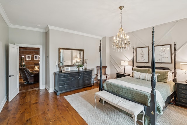 266 Guill Rd, Mount Juliet, TN 37122 - bedroom with a chandelier, dark wood-type flooring, crown molding, and baseboards
