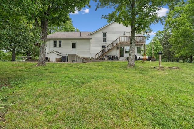 266 Guill Rd, Mount Juliet, TN 37122 - rear view of house with a lawn, a deck, stairway, and cooling unit