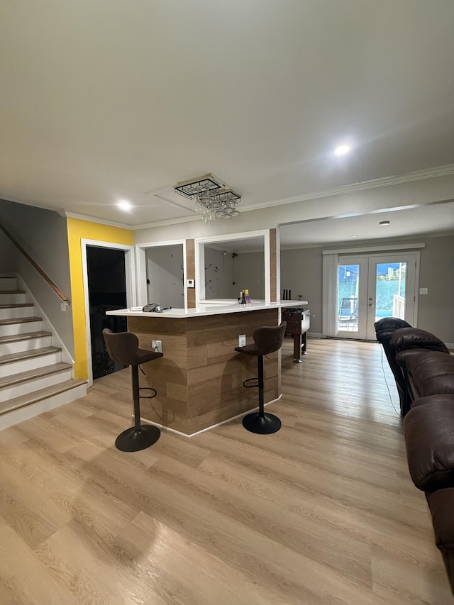 561 Castlegate Dr, Nashville, TN 37217 - indoor bar featuring crown molding, light wood-style floors, stairway, french doors, and recessed lighting