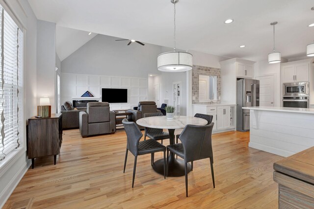 175 Dobson Knob Trl, Nolensville, TN 37135 - dining area featuring light wood-style floors, ceiling fan, high vaulted ceiling, and recessed lighting