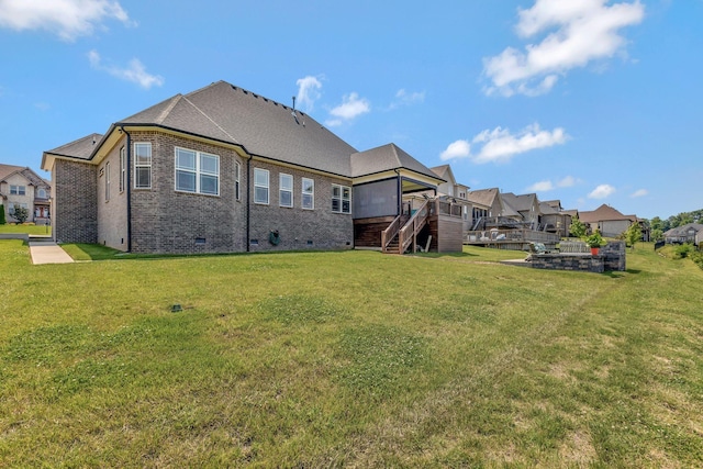 175 Dobson Knob Trl, Nolensville, TN 37135 - back of property featuring stairway, crawl space, brick siding, a wooden deck, and a lawn