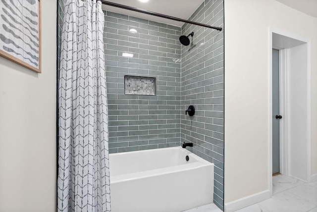 36 Lealand Dr, Clarksville, TN 37042 - bathroom featuring marble look tiles, shower / tub combo with curtain, and baseboards
