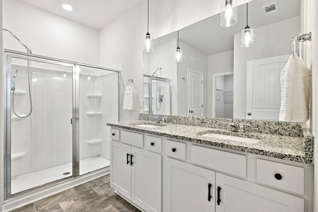 207 Addison Ave, Chapel Hill, TN 37034 - full bathroom featuring a shower stall, double vanity, and a walk in closet