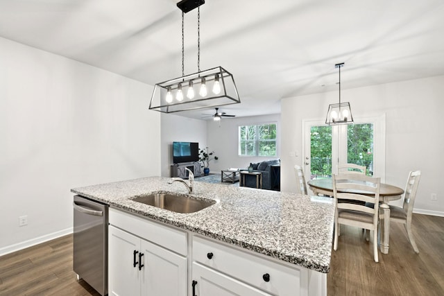 207 Addison Ave, Chapel Hill, TN 37034 - kitchen with dishwasher, a sink, baseboards, open floor plan, and a center island with sink