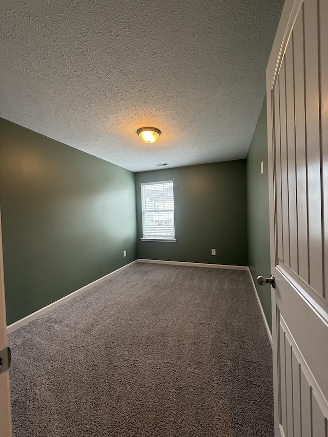 412 Moshe Mualem Pl, La Vergne, TN 37086 - unfurnished room with carpet floors, baseboards, and a textured ceiling