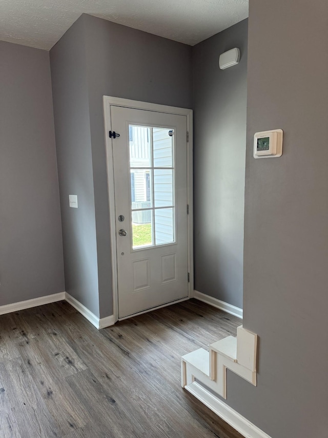 412 Moshe Mualem Pl, La Vergne, TN 37086 - doorway to outside with wood finished floors and baseboards