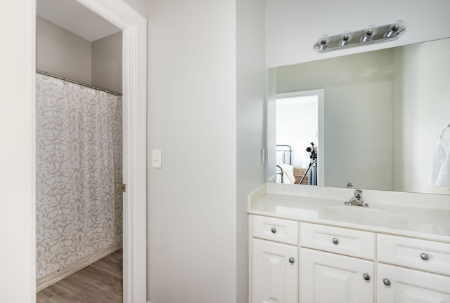 113 Joshuas Run, Goodlettsville, TN 37072 - bathroom with vanity, wood finished floors, and baseboards