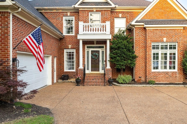 113 Joshuas Run, Goodlettsville, TN 37072 - entrance to property with driveway, brick siding, an attached garage, and a shingled roof