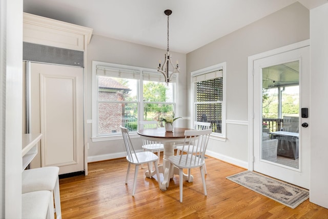 113 Joshuas Run, Goodlettsville, TN 37072 - dining area featuring light wood-style floors, baseboards, a chandelier, and plenty of natural light