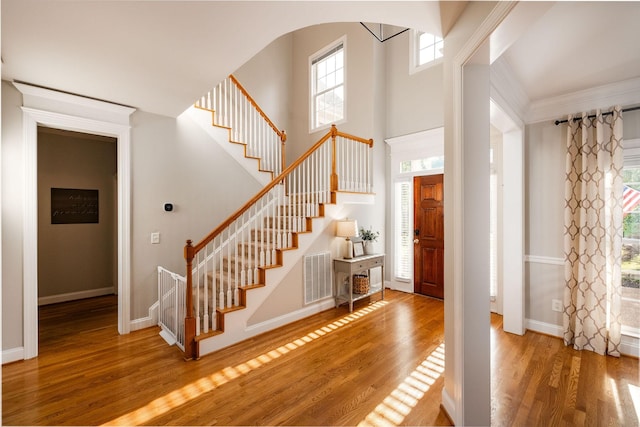 113 Joshuas Run, Goodlettsville, TN 37072 - foyer with stairway, wood finished floors, baseboards, and a high ceiling