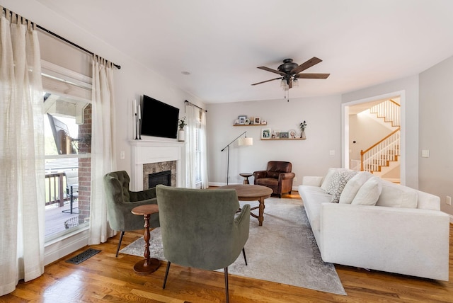 113 Joshuas Run, Goodlettsville, TN 37072 - living area with a ceiling fan, stairway, a fireplace, and wood finished floors