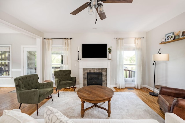 113 Joshuas Run, Goodlettsville, TN 37072 - living room featuring a high end fireplace, a ceiling fan, wood finished floors, and baseboards