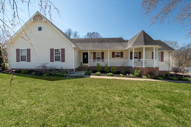 55 Bluebird Ln, Lafayette, TN 37083 - victorian home featuring a porch, a front lawn, and roof with shingles