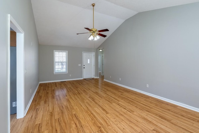 55 Bluebird Ln, Lafayette, TN 37083 - unfurnished living room with lofted ceiling, ceiling fan, light wood-type flooring, and baseboards