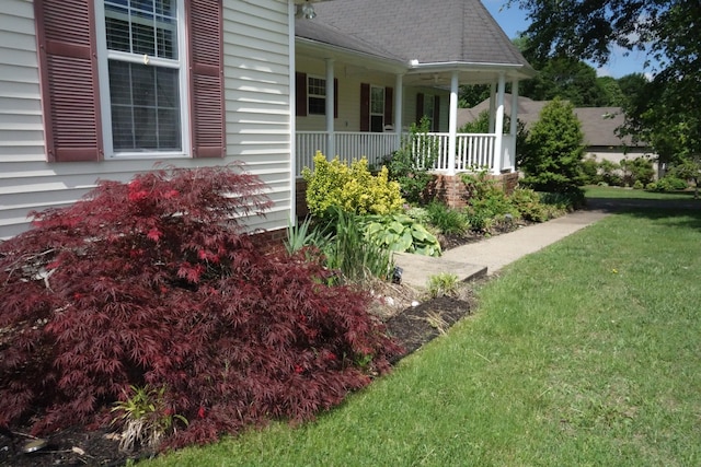 55 Bluebird Ln, Lafayette, TN 37083 - view of green lawn with covered porch